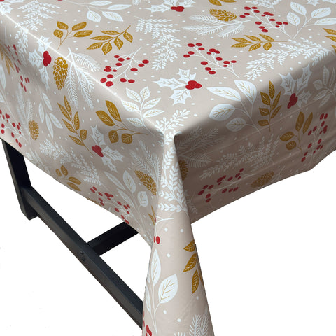 Beige Holly Christmas vinyl tablecloth – festive waterproof PVC table cover with wipe-clean surface and winter holiday design