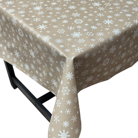 Beige snowflake Christmas vinyl tablecloth – festive waterproof PVC table cover with wipe-clean surface and winter holiday design
