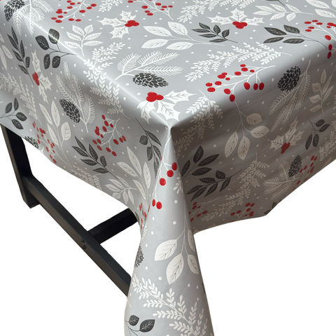 Mono Holly Christmas vinyl tablecloth – festive waterproof PVC table cover with wipe-clean surface and winter holiday design
