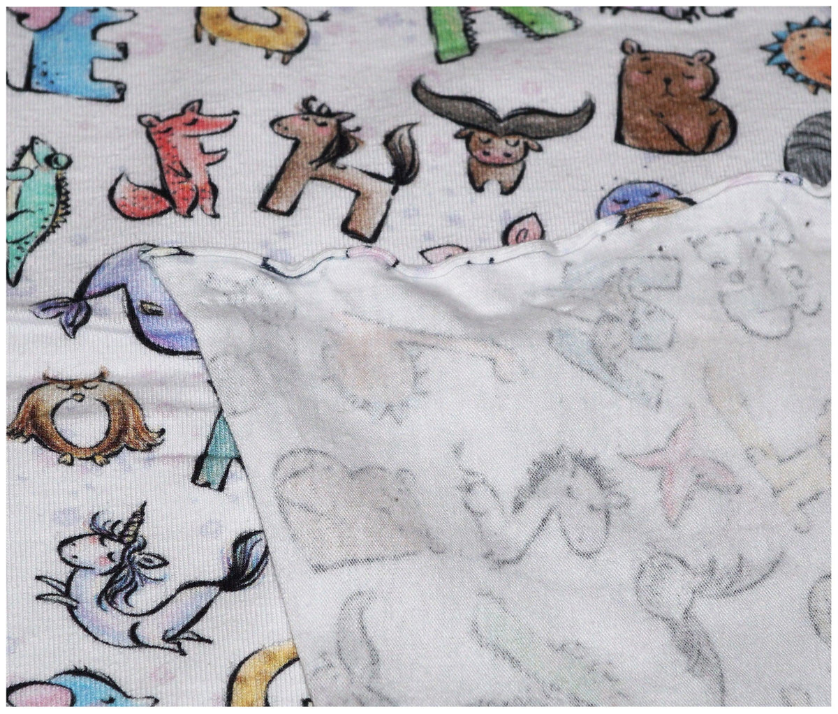 Alphabet Animal Printed Jersey - The Fabric Trade